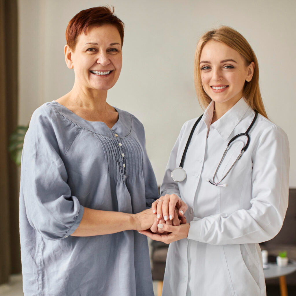 Breast Cancer survivor with doctor